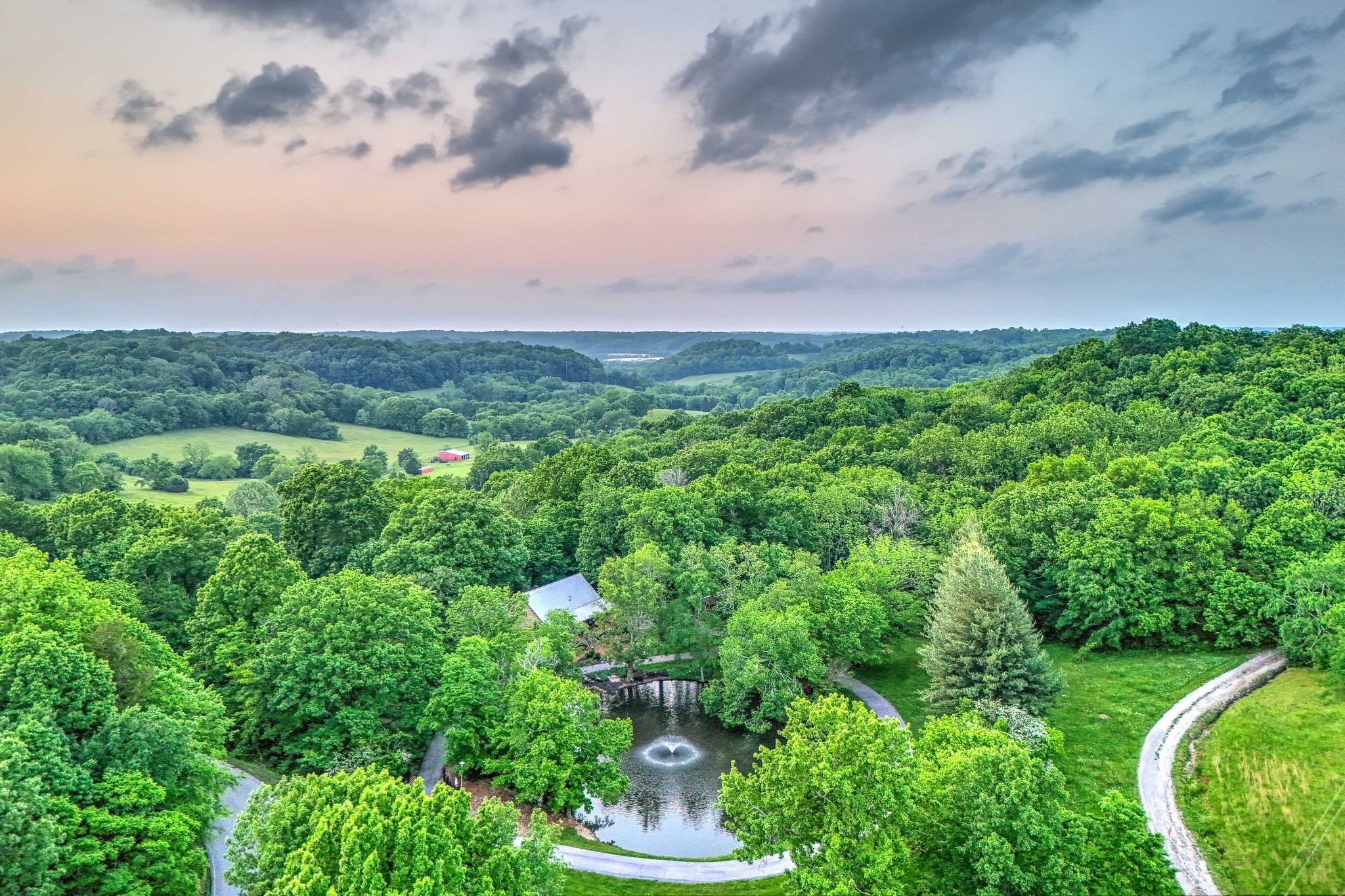 1708 Sugar Ridge Road Spring Hill, TN 37174 - Photo 57 of 70 a view of a garden with an buildings