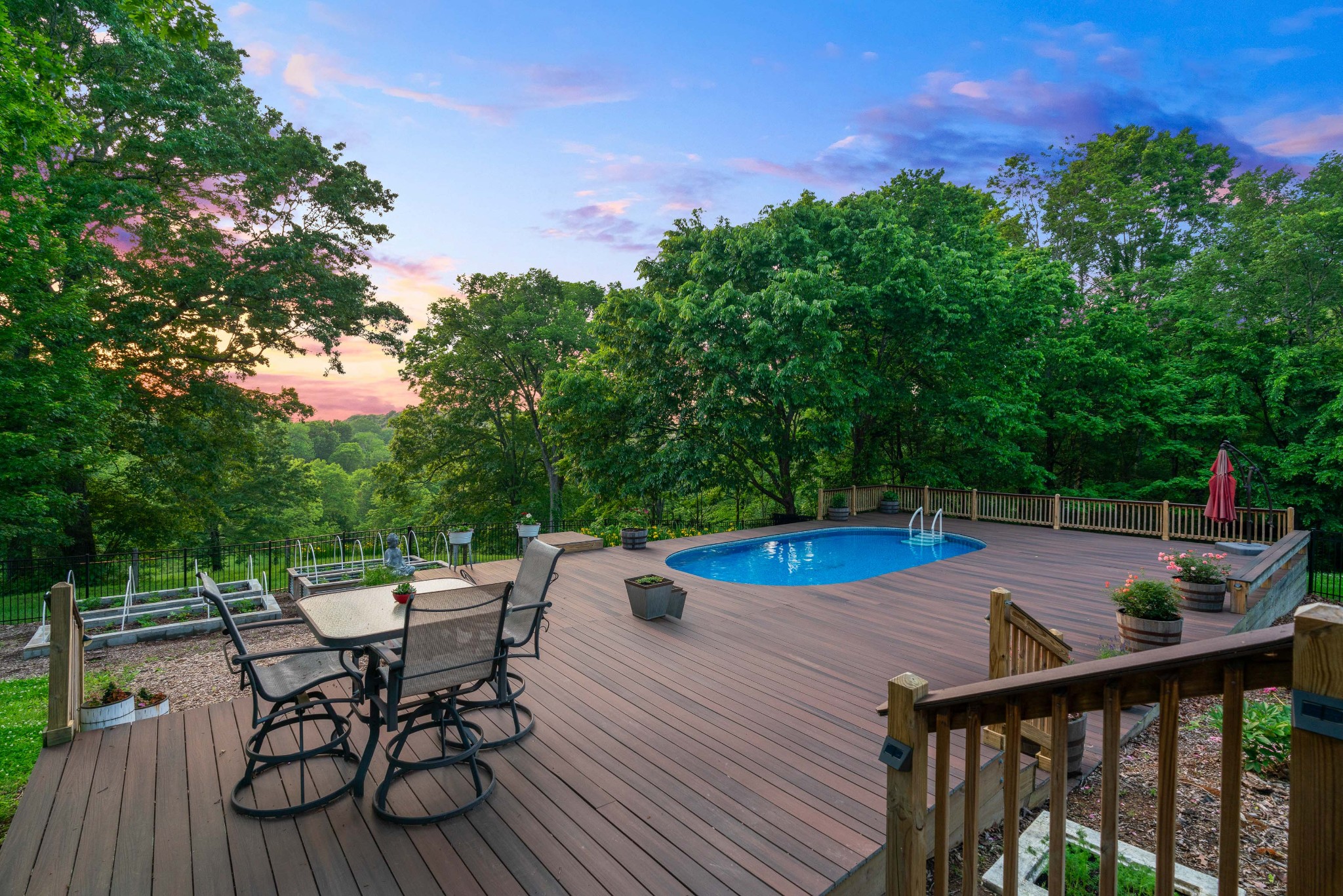 1708 Sugar Ridge Road Spring Hill, TN 37174 - Photo 62 of 70 a view of a chairs and table on the wooden deck