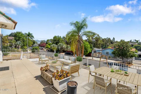 a view of a patio with swimming pool