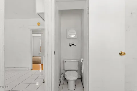 a view of a utility room with closet