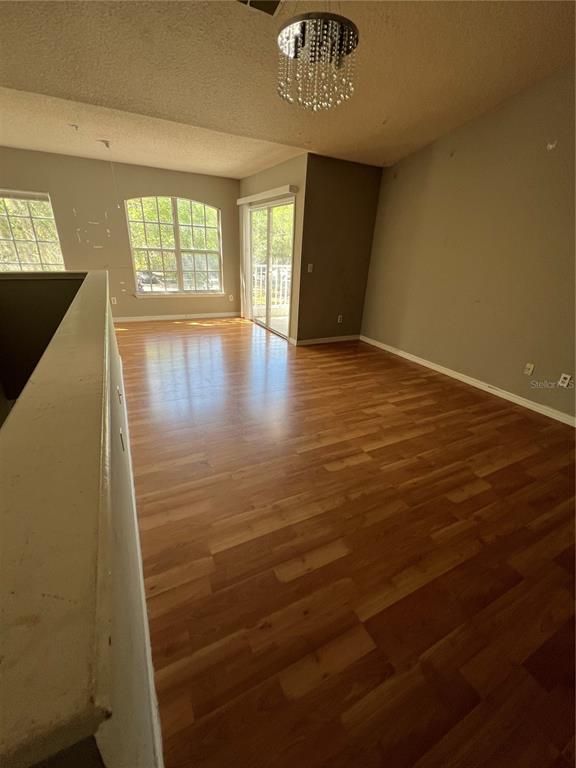 4316 South Kirkman Road, Unit 1604 Orlando, FL 32811 - Photo 4 of 8 a view of an empty room with a window
