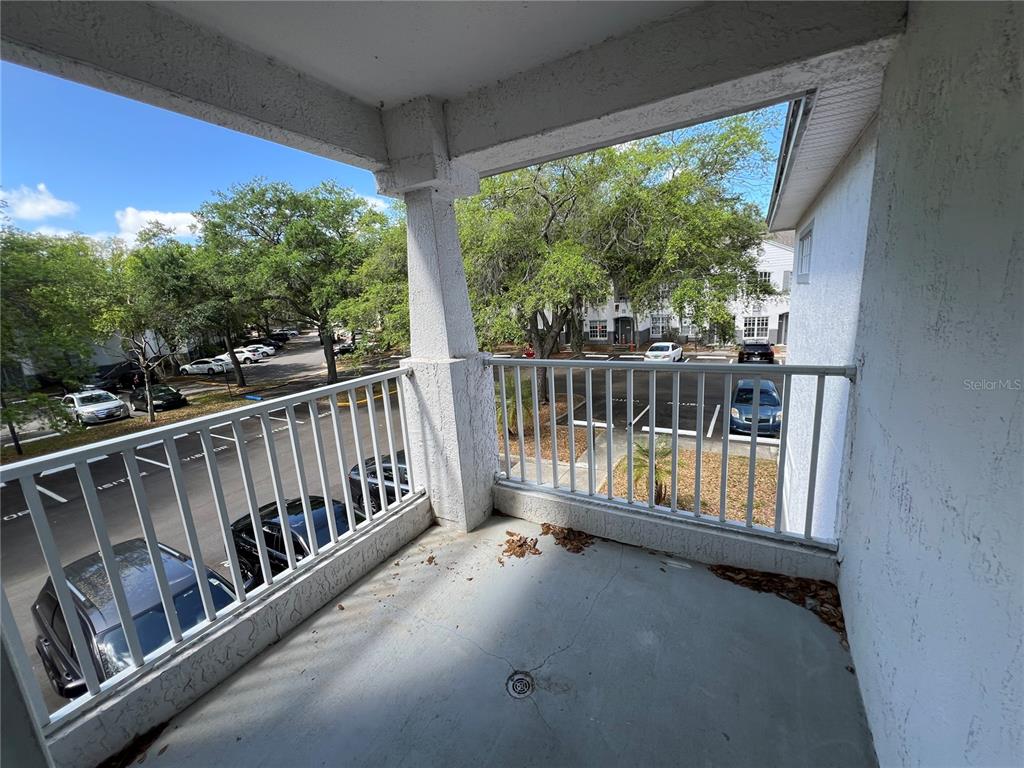 4316 South Kirkman Road, Unit 1604 Orlando, FL 32811 - Photo 6 of 8 a view of balcony with couch