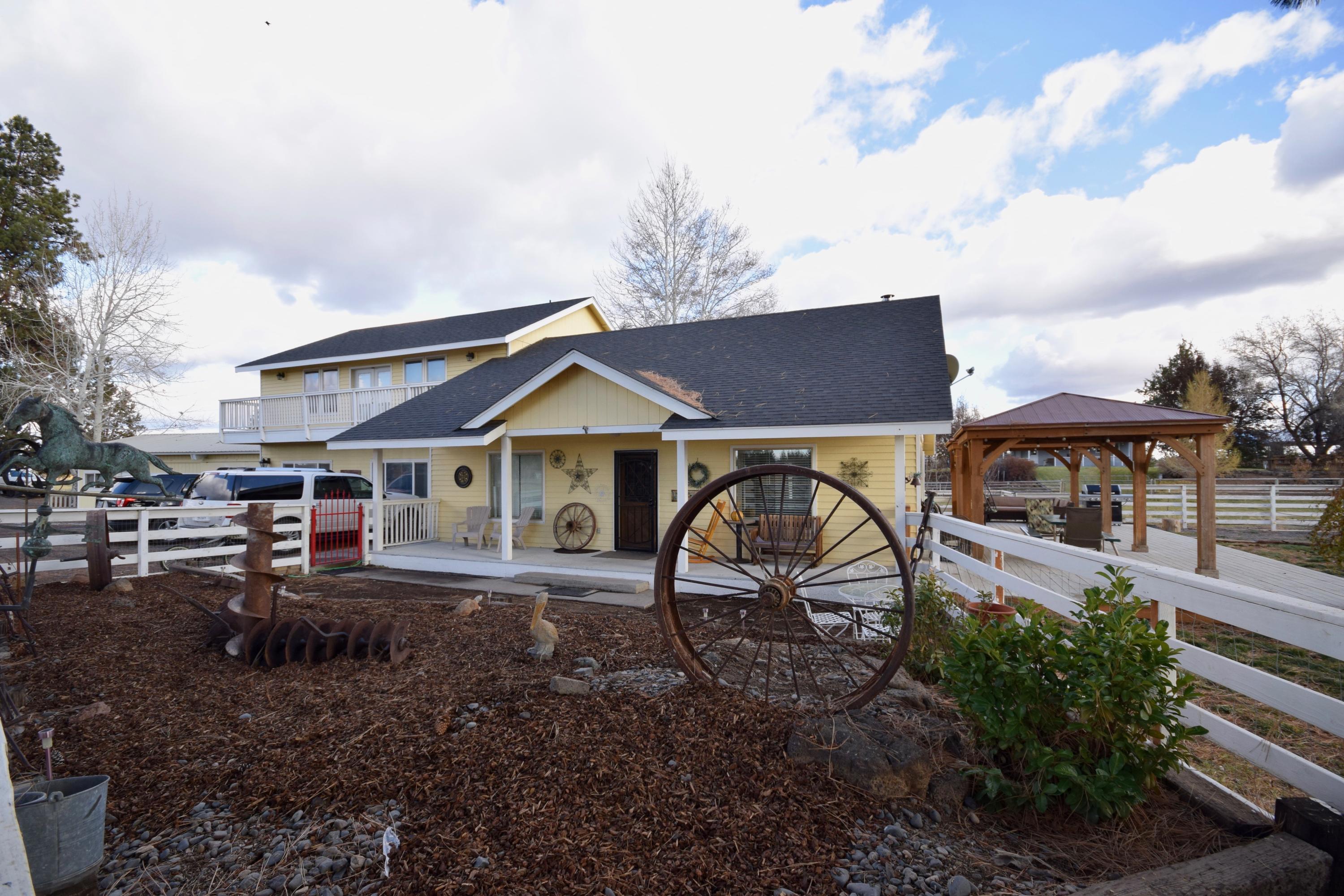 22169 Nelson Road Bend, OR 97701 - Photo 9 of 42 a view of a house with backyard and sitting area
