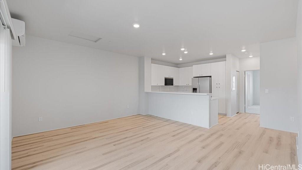 91-1170 Hoonaauao Street, Unit 1702 Kapolei, HI 96707 - Photo 8 of 21 Spacious living/dining room