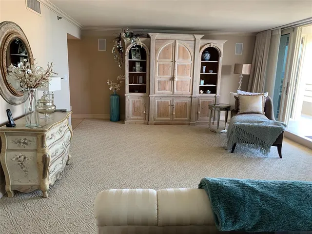 a room with kitchen island granite countertop lots of counter top space