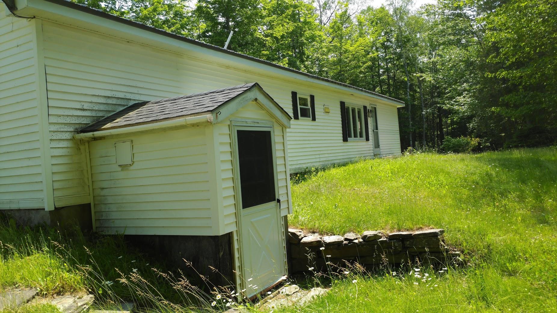 237 Board Eddy Road Dover-Foxcroft, ME 04426 - Photo 14 of 33 Ellis Exterior Facing Road