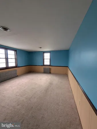 a view of an empty room with window