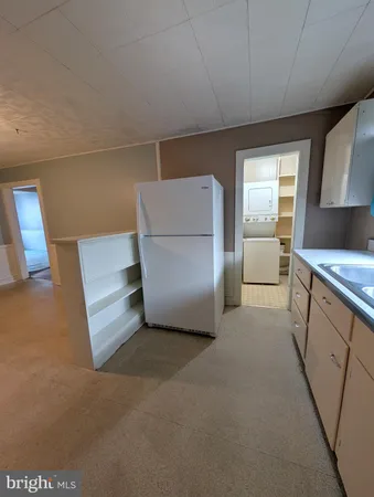 a utility room with washer and dryer