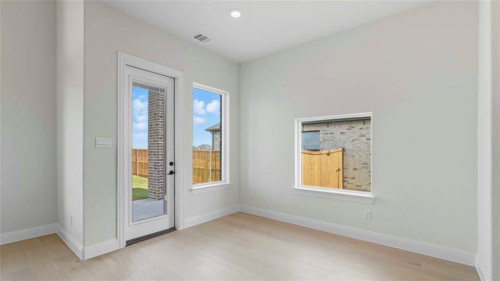 1011 Pitchfork Road Royse City, TX 75189 - Photo 7 of 19 an empty room with windows