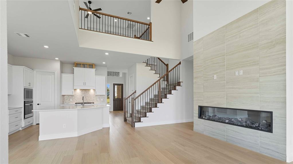 1011 Pitchfork Road Royse City, TX 75189 - Photo 8 of 19 a view of kitchen with furniture and wooden floor