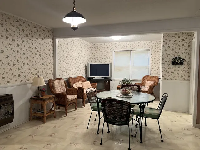a view of a dining room with furniture