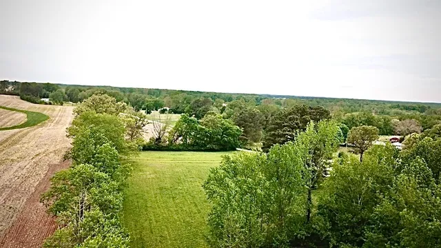 a view of a lake with a building in the background