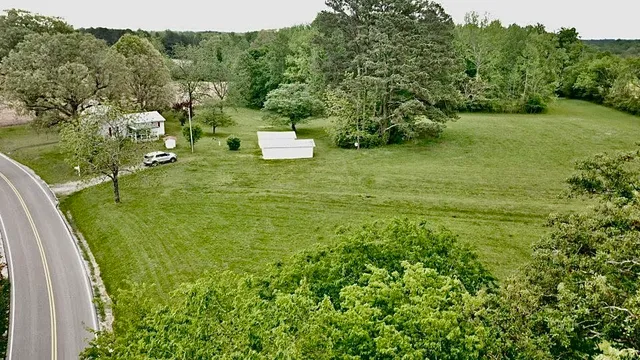 a view of a yard with an outdoor space