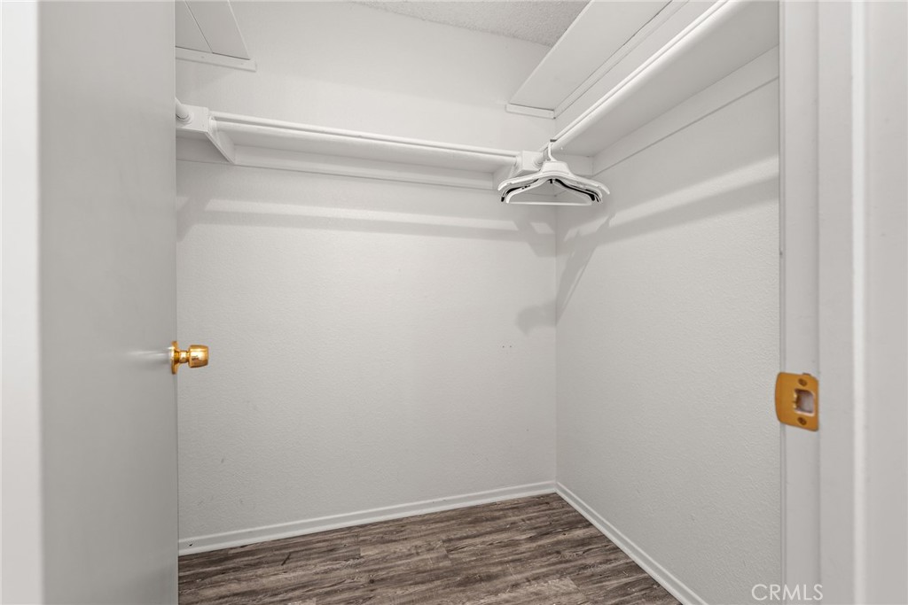 786 Zephyr Circle Hemet, CA 92543 - Photo 16 of 26 a view of a room with rack on the wall