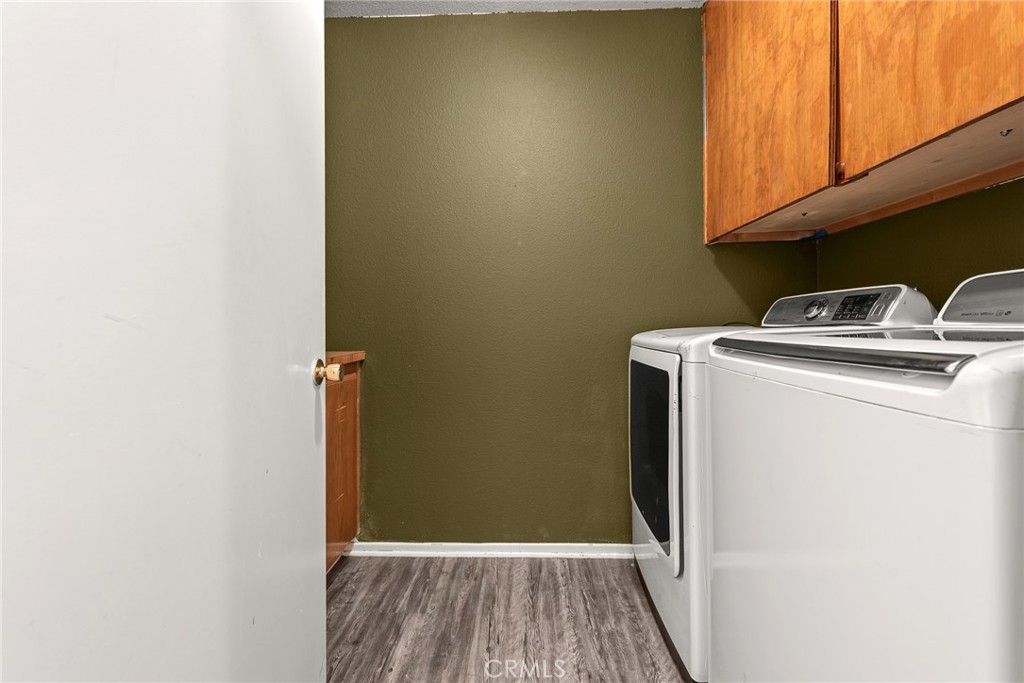 786 Zephyr Circle Hemet, CA 92543 - Photo 19 of 26 a utility room with dryer and washer