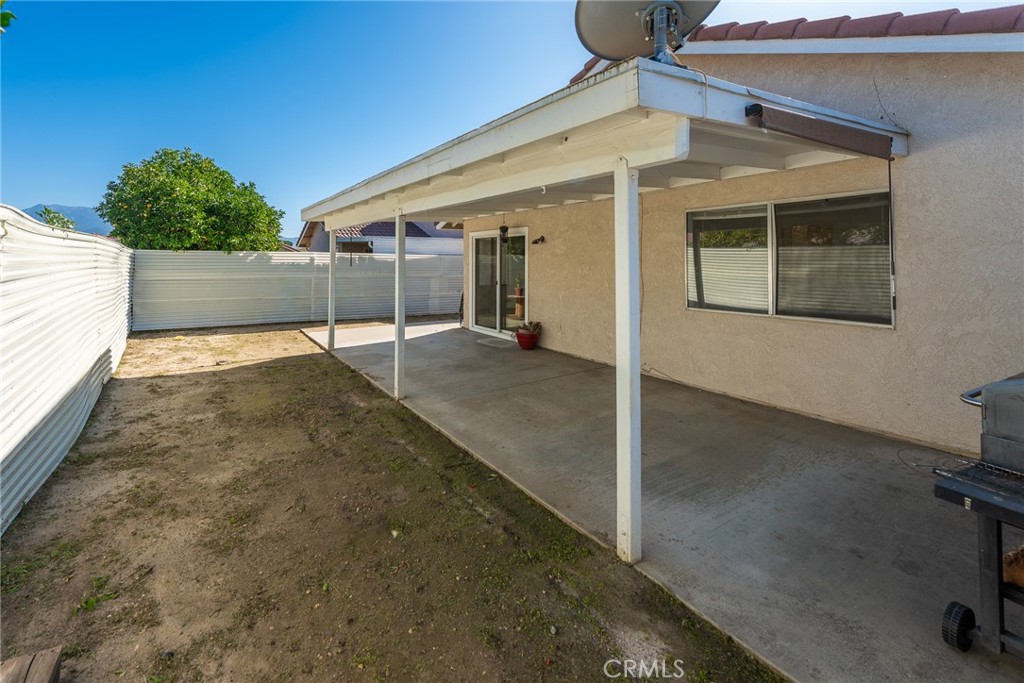 786 Zephyr Circle Hemet, CA 92543 - Photo 7 of 26 a view of a house with a backyard