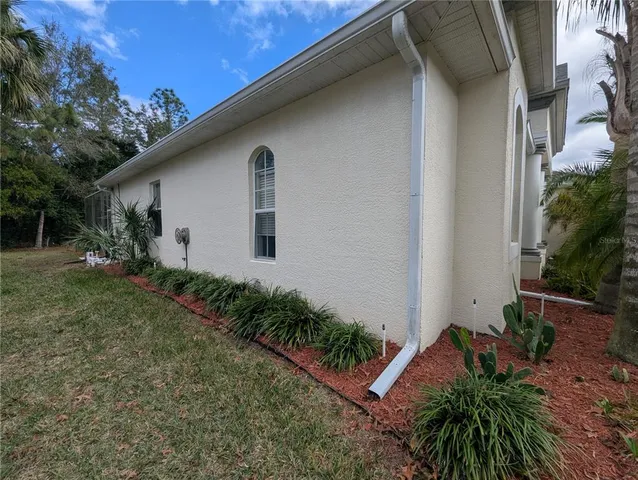 a view of a street with houses on both side