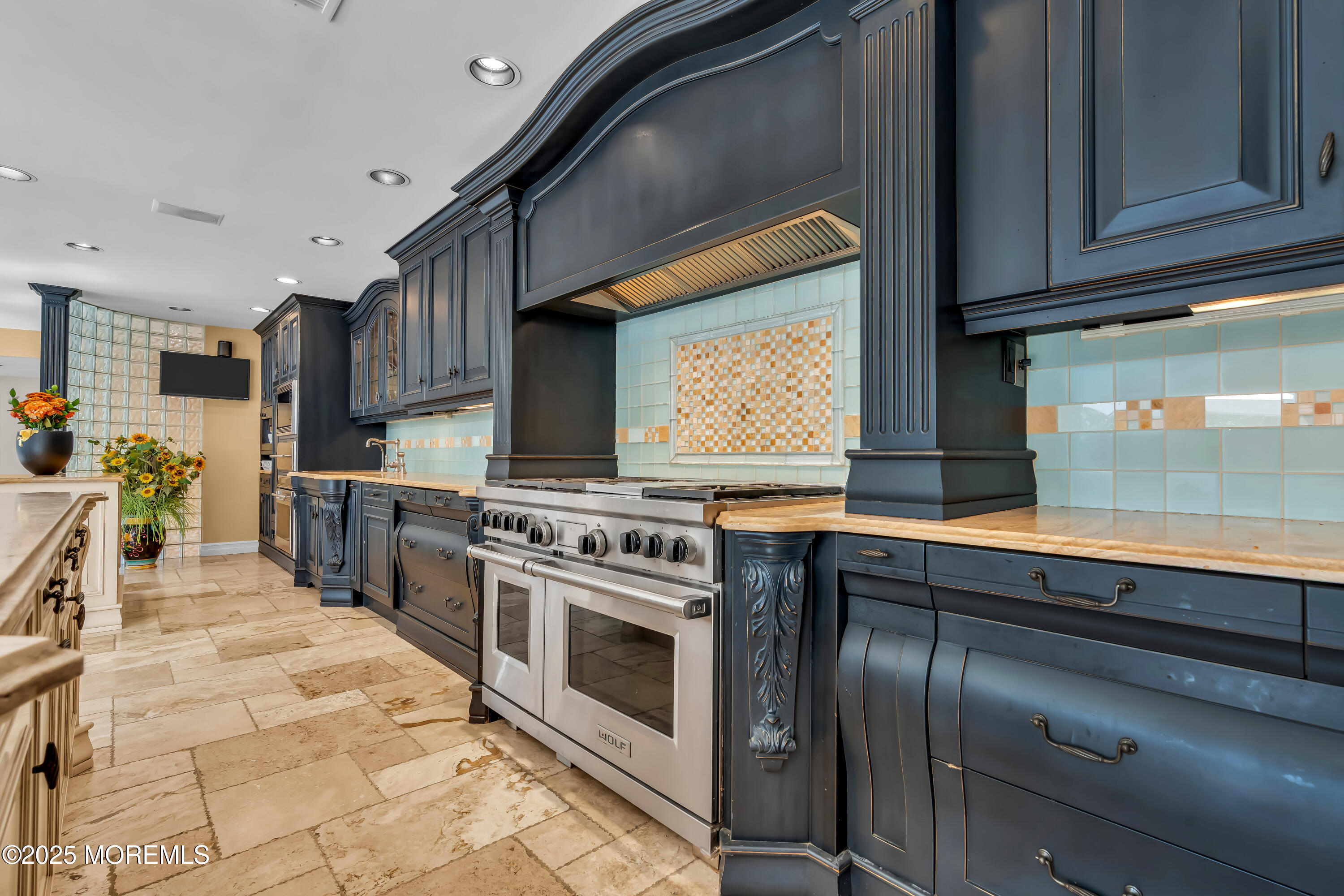 1264 Deal Road Asbury Park, NJ 07712 - Photo 13 of 70 a kitchen with stainless steel appliances granite countertop a stove a sink and a microwave
