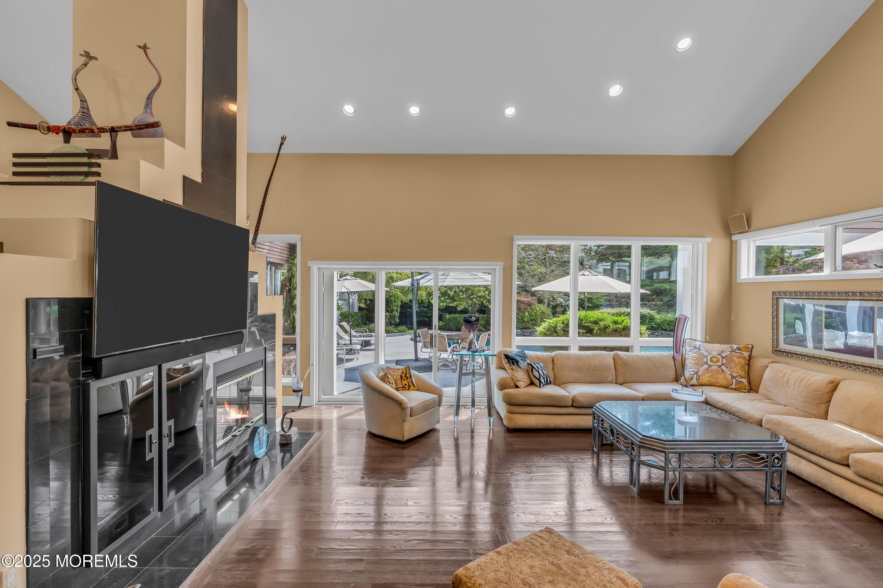 1264 Deal Road Asbury Park, NJ 07712 - Photo 23 of 70 a living room with furniture and a flat screen tv