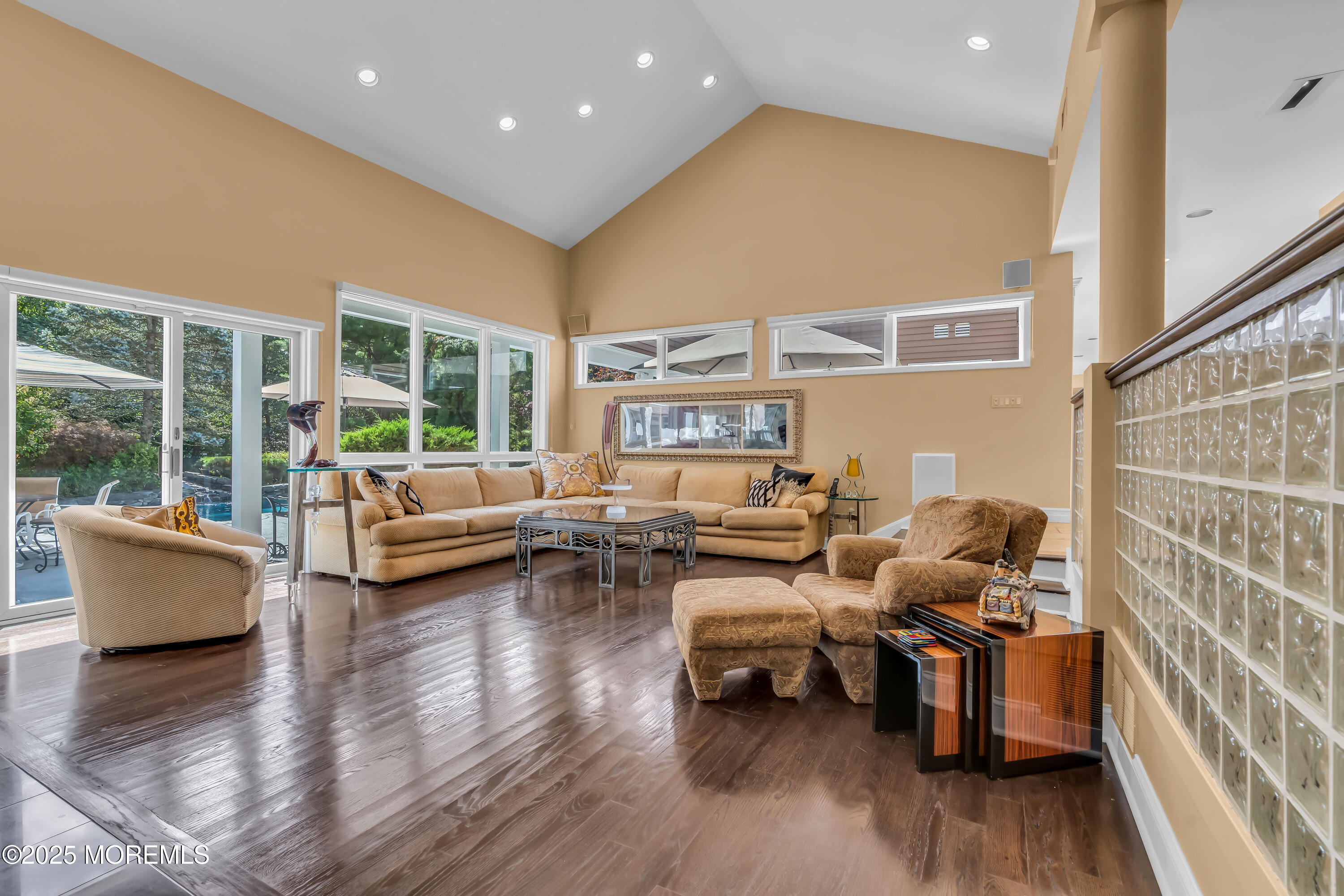 1264 Deal Road Asbury Park, NJ 07712 - Photo 24 of 70 a living room with furniture and floor to ceiling windows