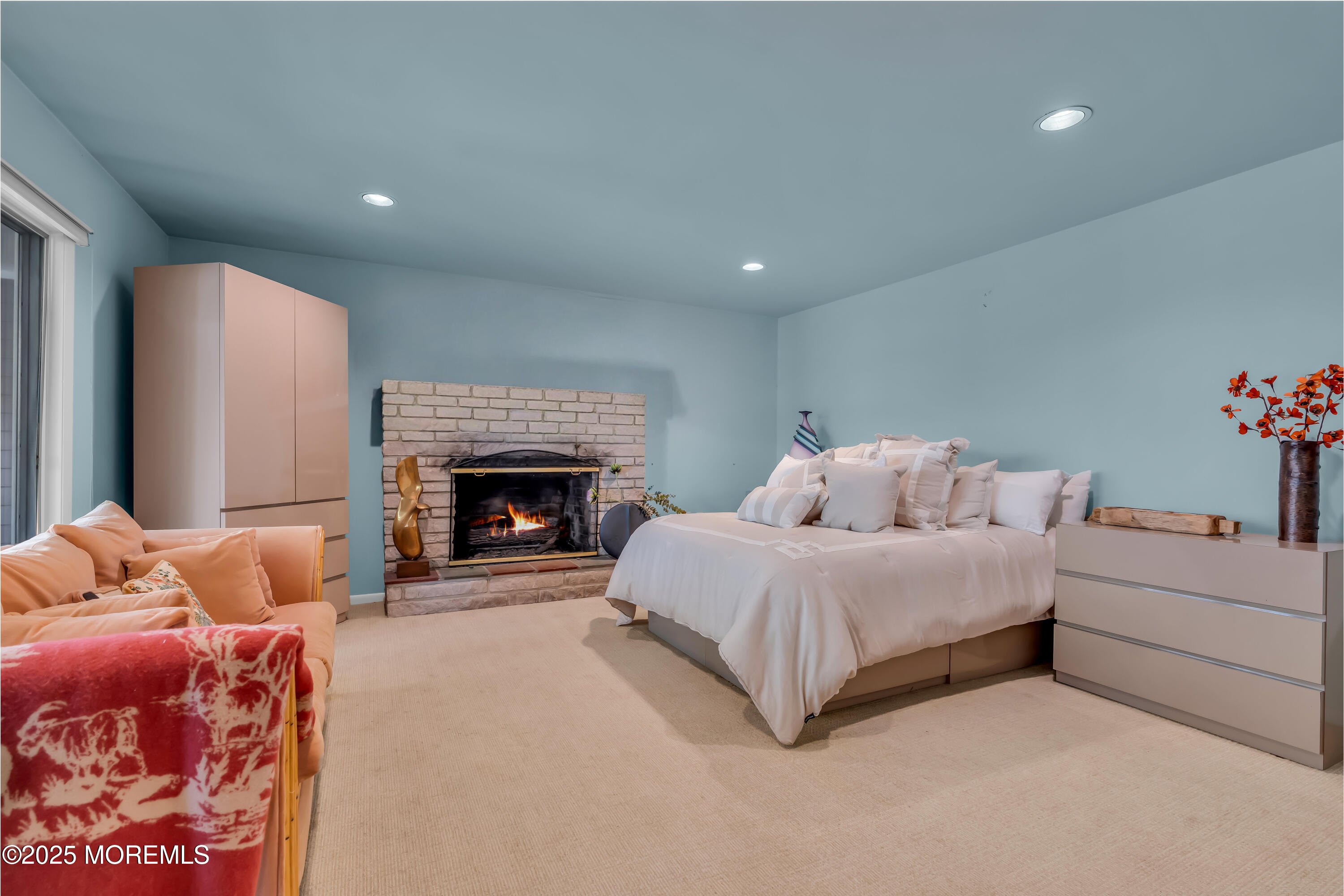 1264 Deal Road Asbury Park, NJ 07712 - Photo 26 of 70 a spacious bedroom with a bed and a fireplace