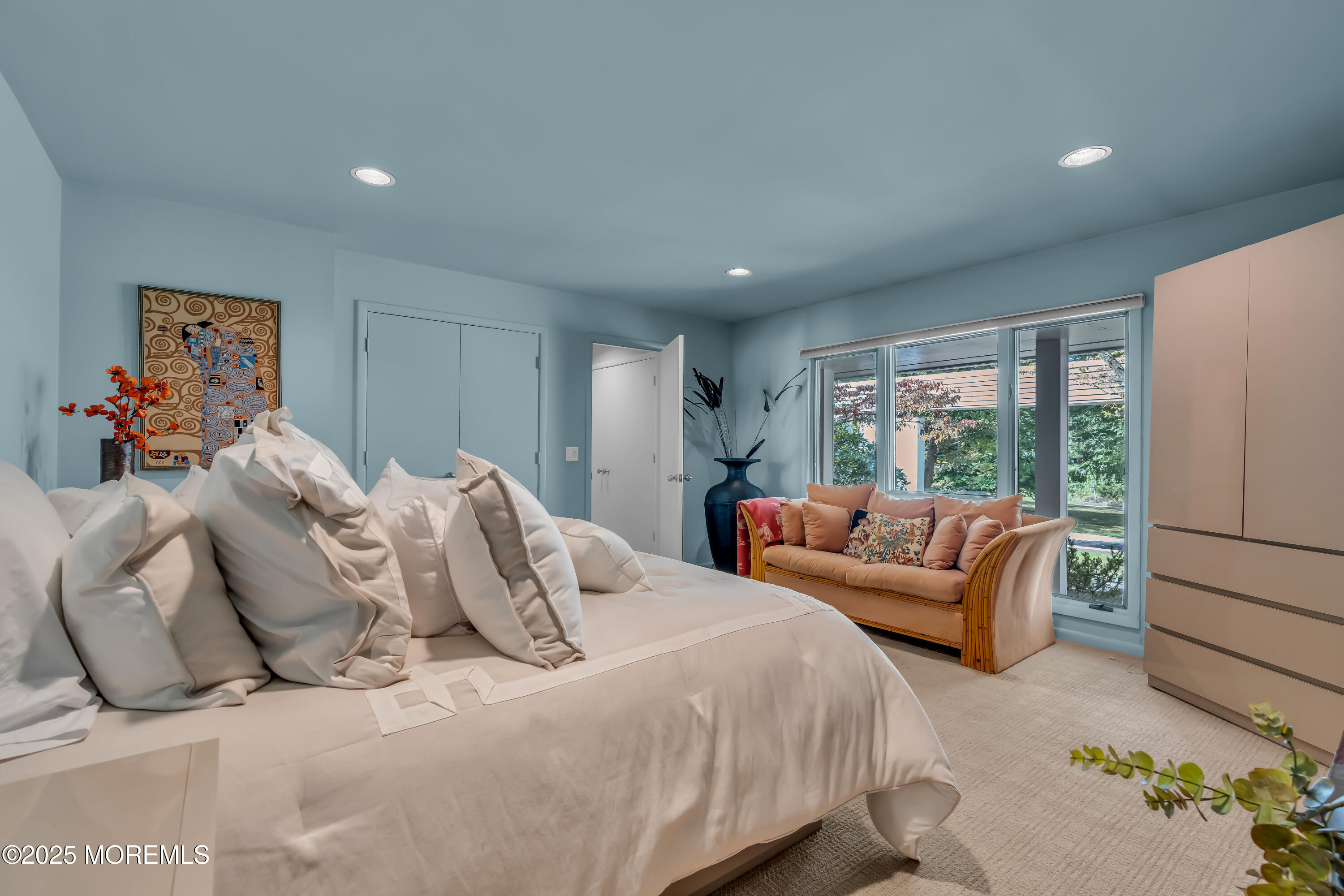 1264 Deal Road Asbury Park, NJ 07712 - Photo 27 of 70 a bedroom with a bed and a couch