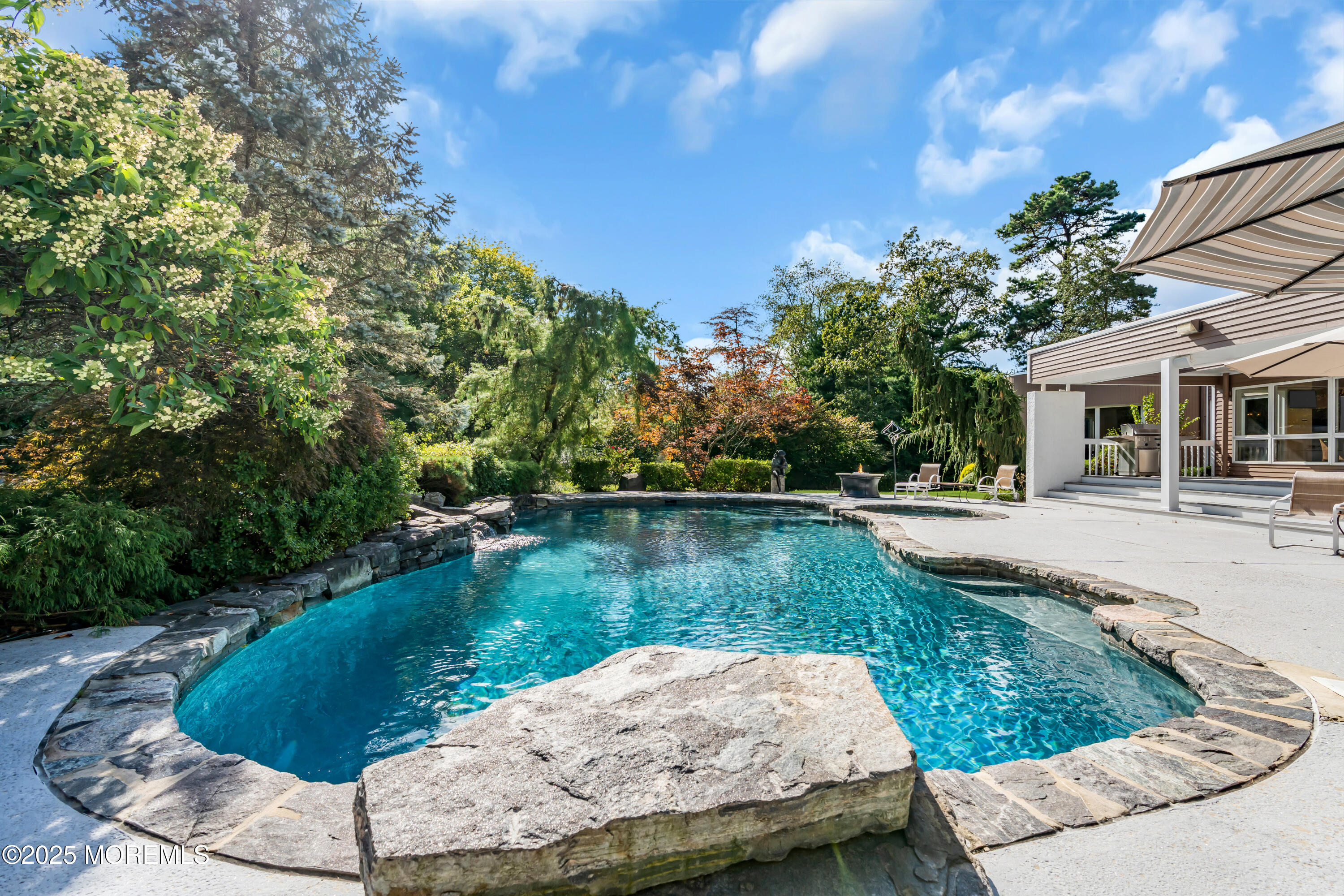 1264 Deal Road Asbury Park, NJ 07712 - Photo 3 of 70 a view of a swimming pool with a patio