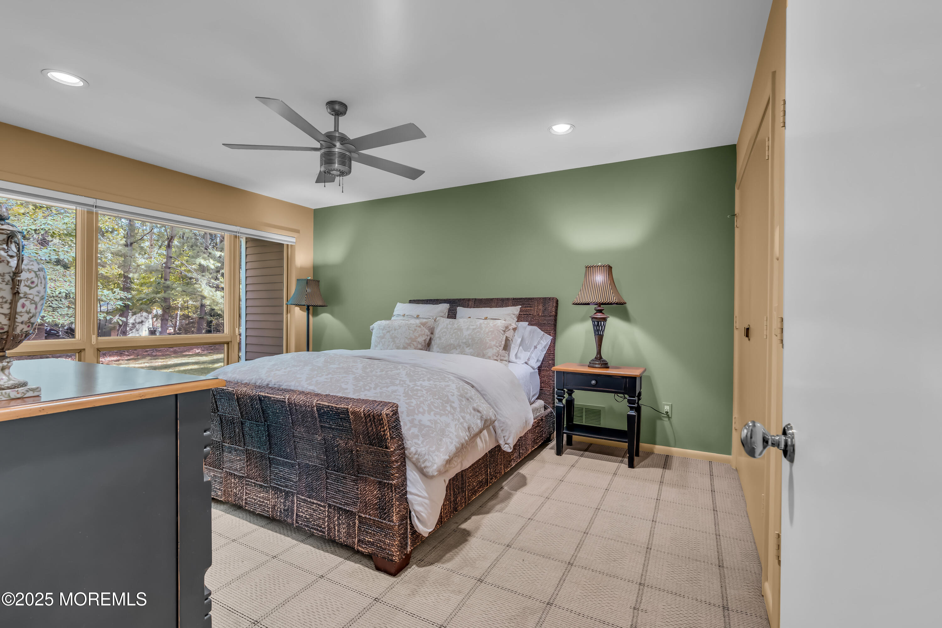 1264 Deal Road Asbury Park, NJ 07712 - Photo 35 of 70 a bedroom with a bed and a large window