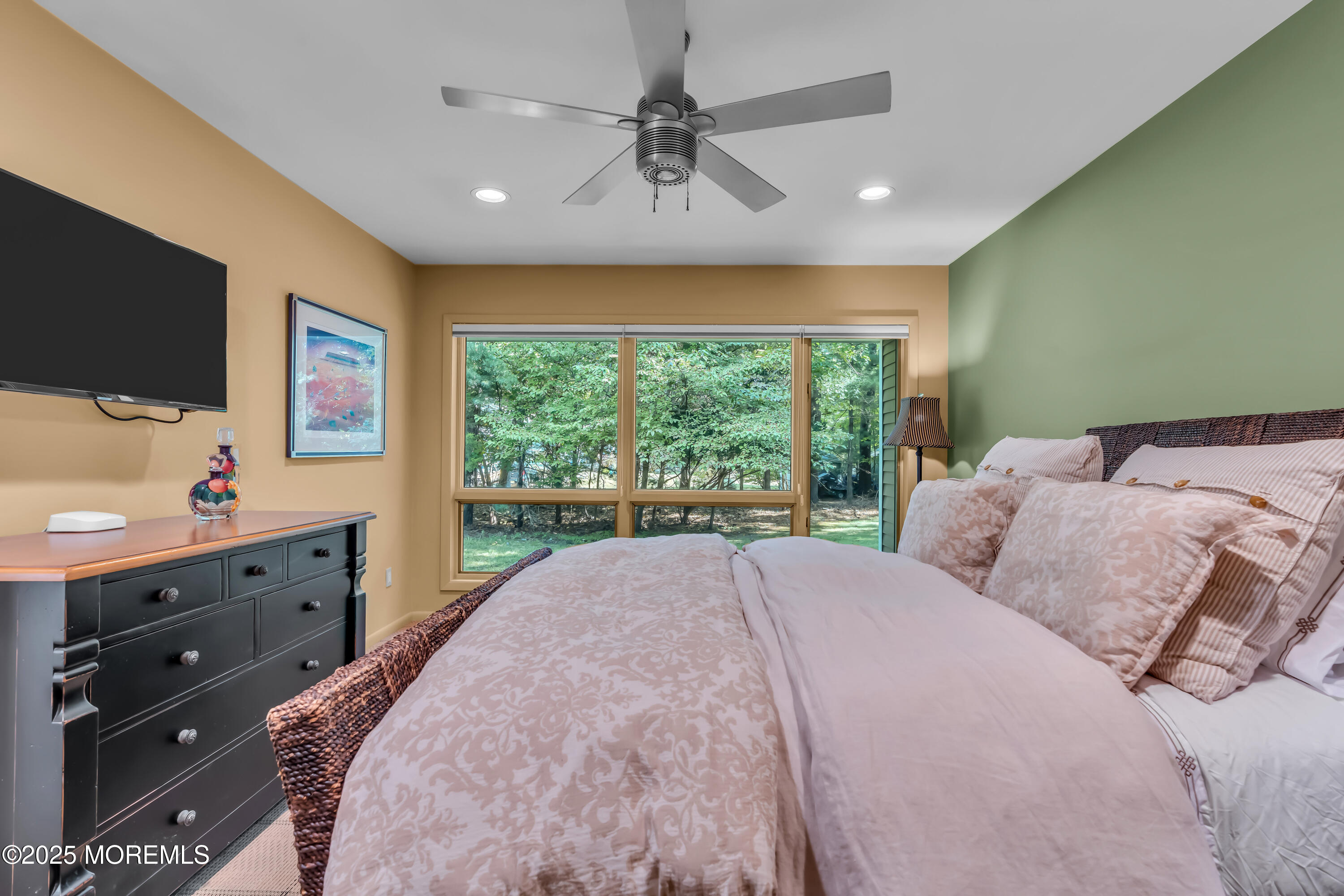 1264 Deal Road Asbury Park, NJ 07712 - Photo 37 of 70 a bed room with a bed tv and a window