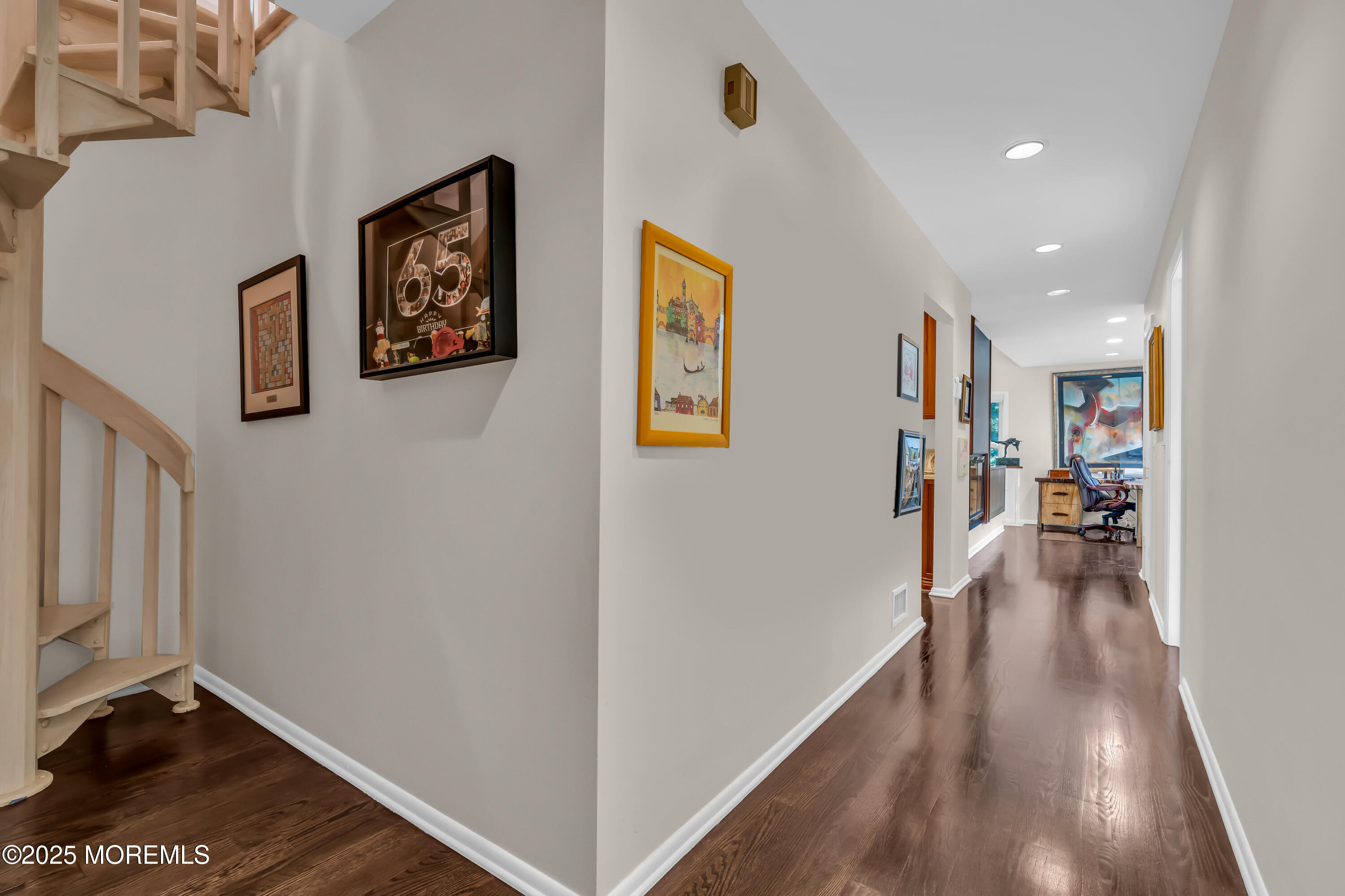1264 Deal Road Asbury Park, NJ 07712 - Photo 38 of 70 a view of a hallway with wooden floor