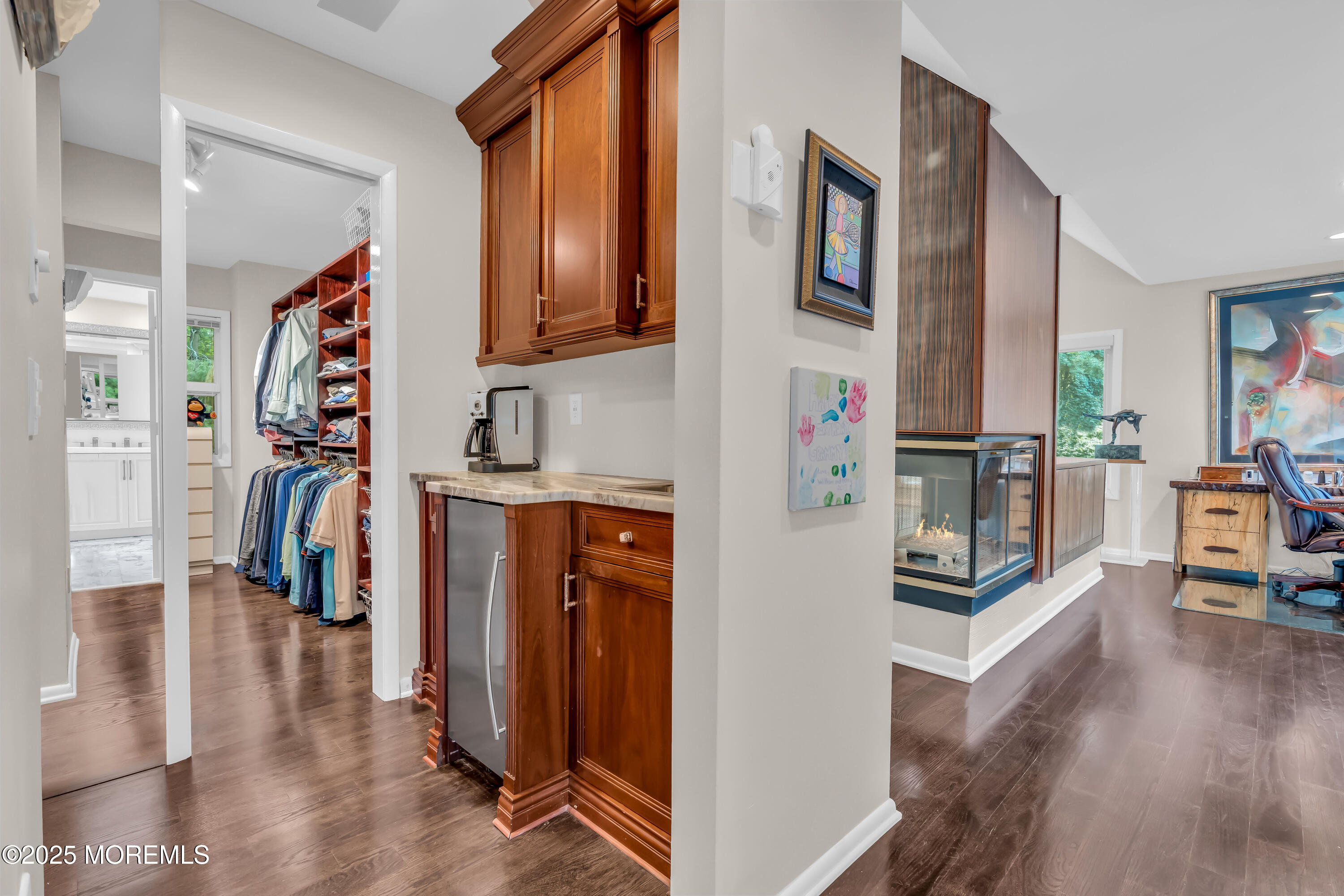1264 Deal Road Asbury Park, NJ 07712 - Photo 39 of 70 a view of a hallway with wooden floor and windows