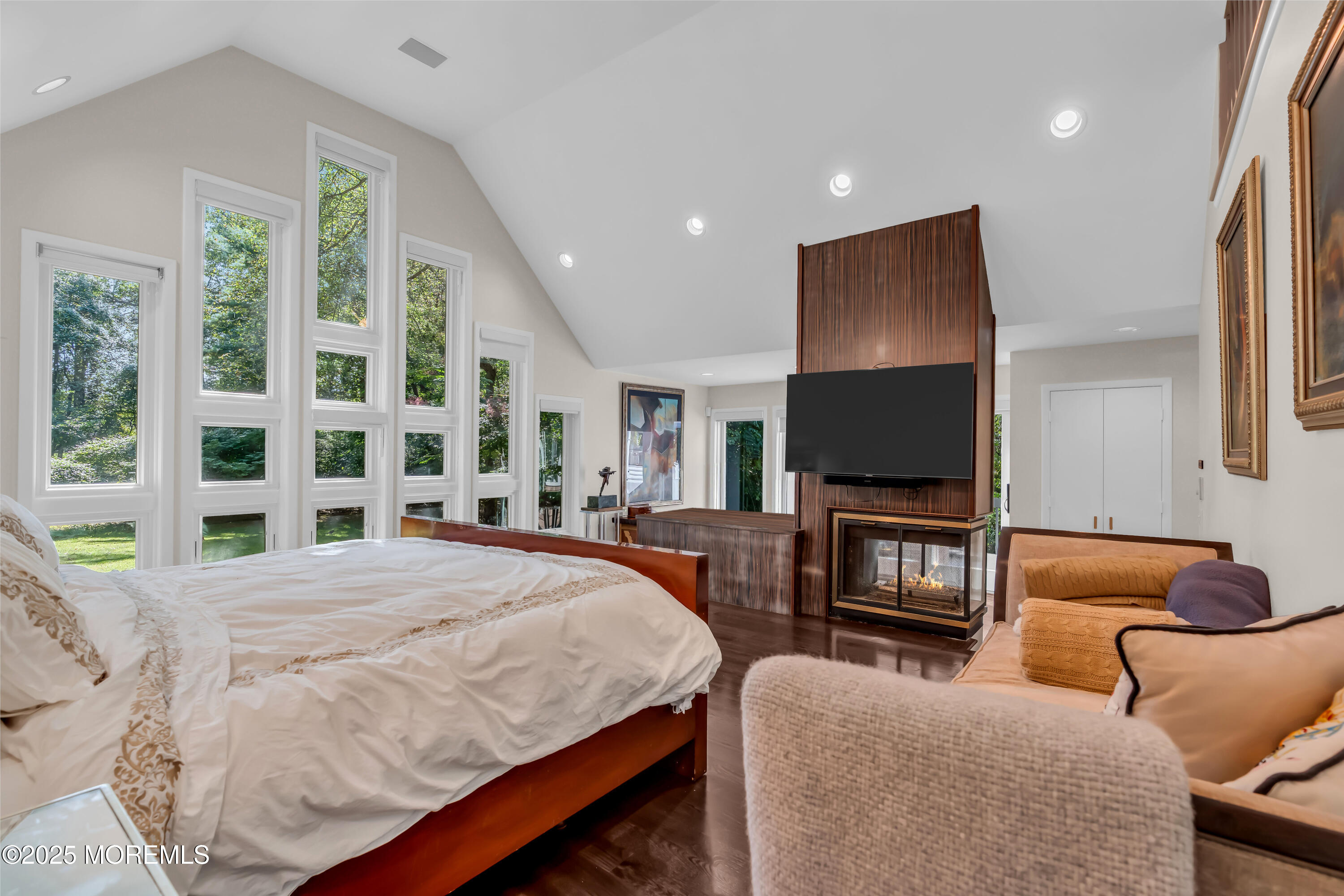 1264 Deal Road Asbury Park, NJ 07712 - Photo 40 of 70 a living room with furniture a flat screen tv and a large window