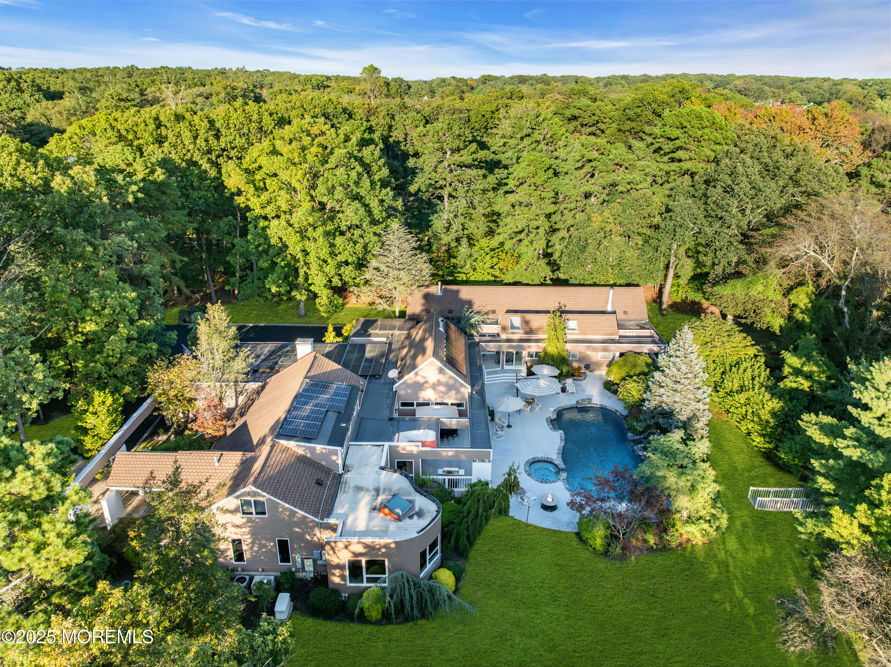 1264 Deal Road Asbury Park, NJ 07712 - Photo 69 of 70 an aerial view of residential houses with outdoor space and trees