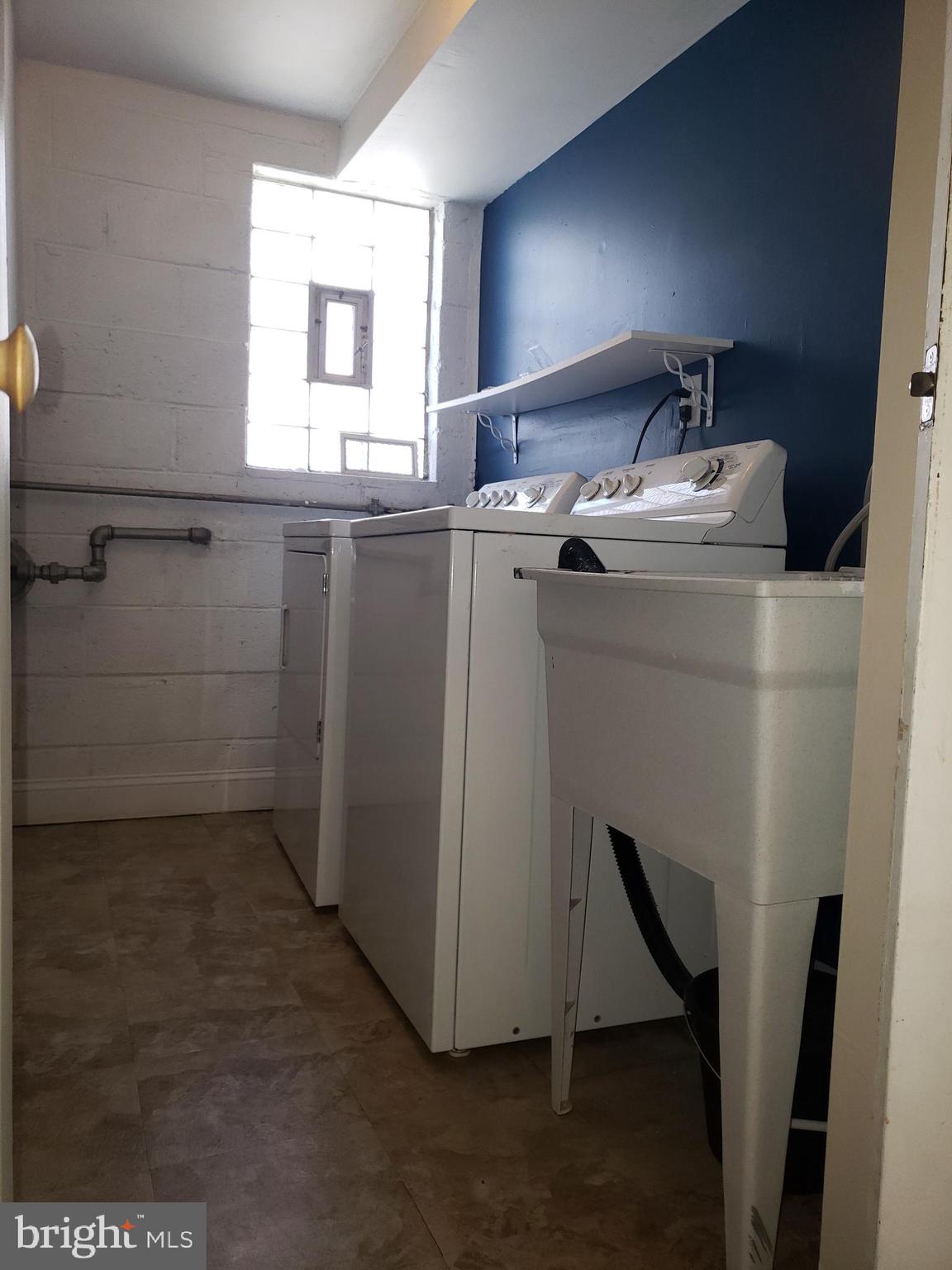 12019 Tyrone Road Philadelphia, PA 19154 - Photo 22 of 35 a utility room with closet dryer and washer