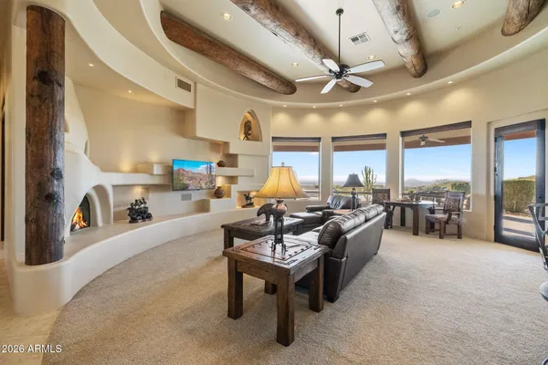 an aerial view of a house with outdoor space