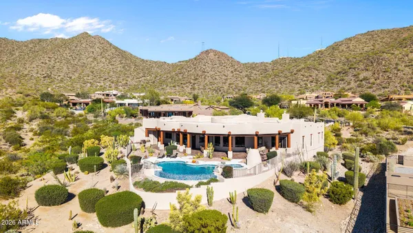 a picture of a bathroom with a sink and a mirror