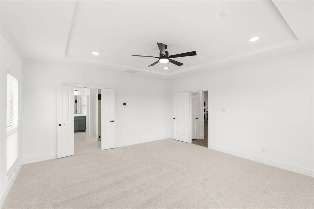 413 Tower Street DeSoto, TX 75115 - Photo 19 of 30 a view of a livingroom with a ceiling fan and window