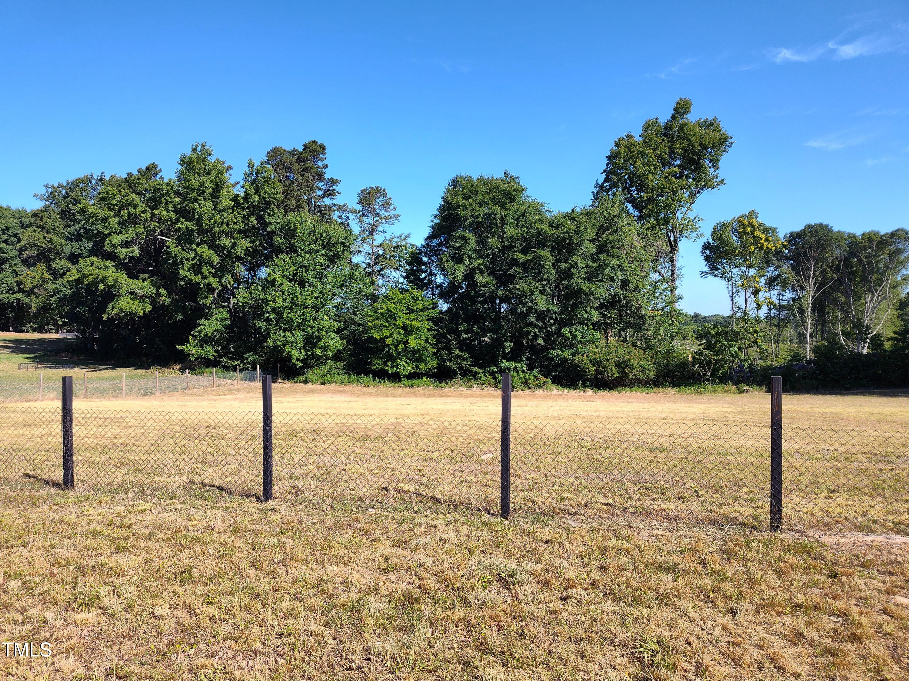 0 Allensville Road Roxboro, NC 27574 - Photo 5 of 7 a street sign with a yard