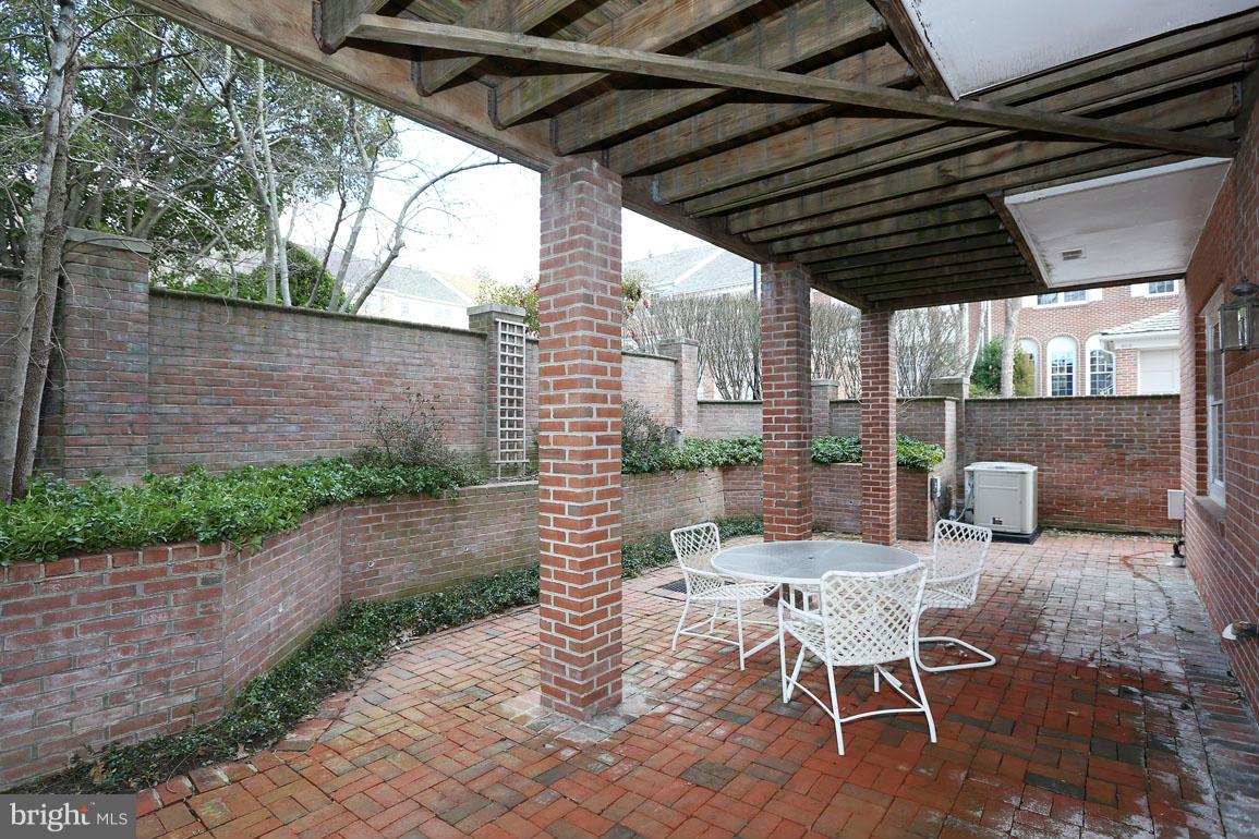 8014 Rising Ridge Road Bethesda, MD 20817 - Photo 20 of 21 Private Patio-off Rec.Room-All Brick