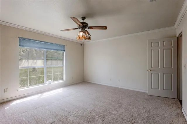 a view of a lake with houses in the back