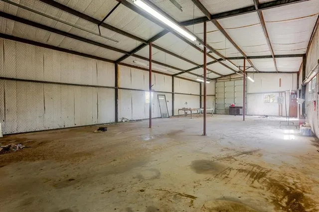 a view of a big yard with lots of green space