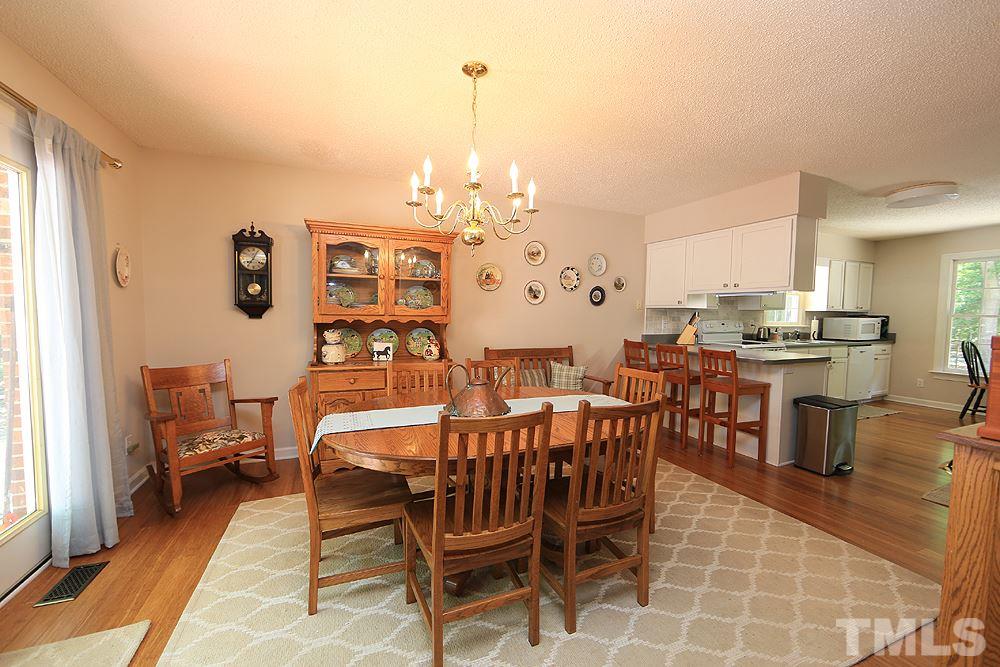 1295 Pilot-Riley Road Zebulon, NC 27597 - Photo 3 of 18 a view of a dining room with furniture