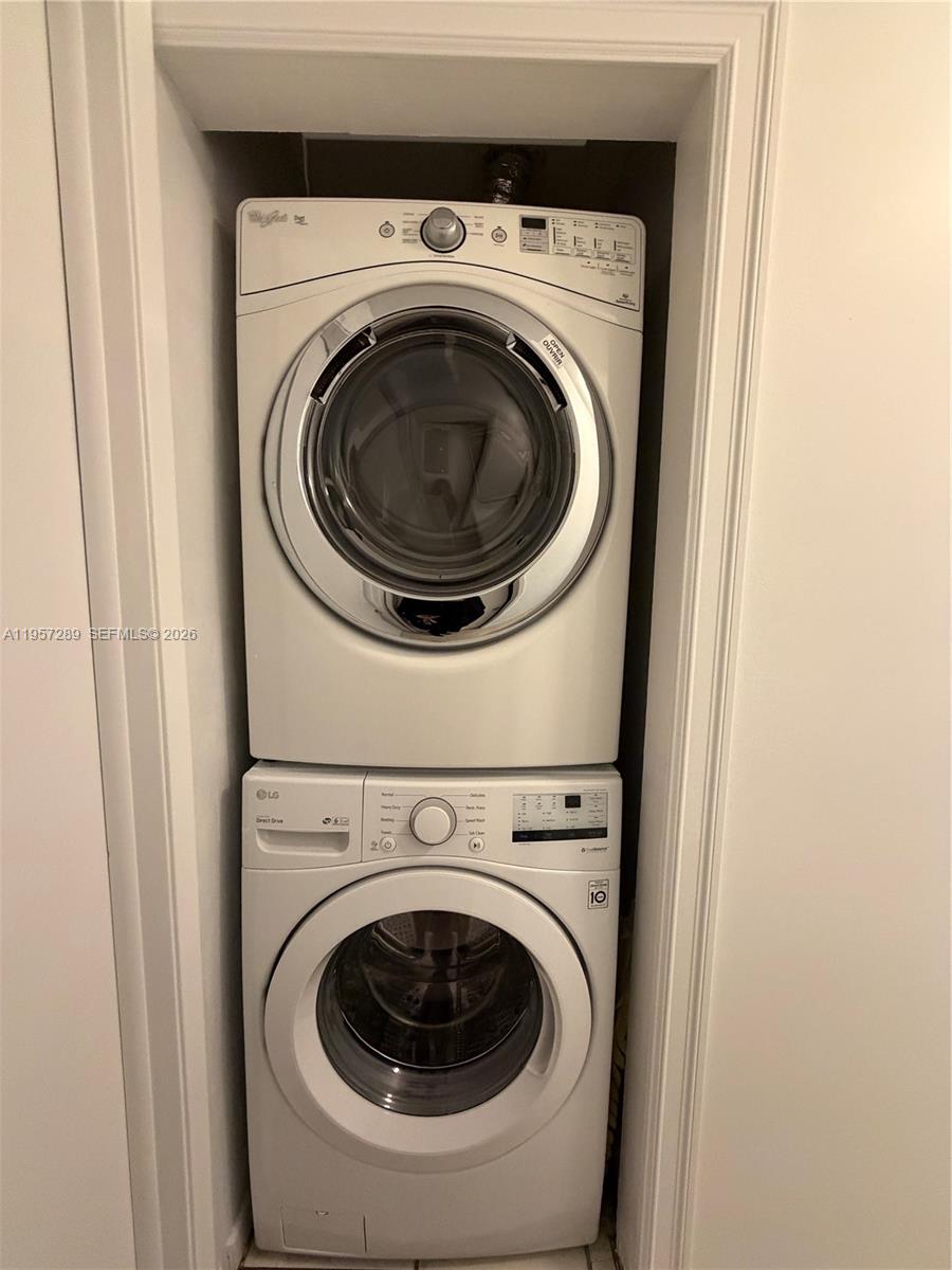 8260 Southwest 149th Court, Unit 9204 Miami, FL 33193 - Photo 12 of 25 a utility room with dryer and washer