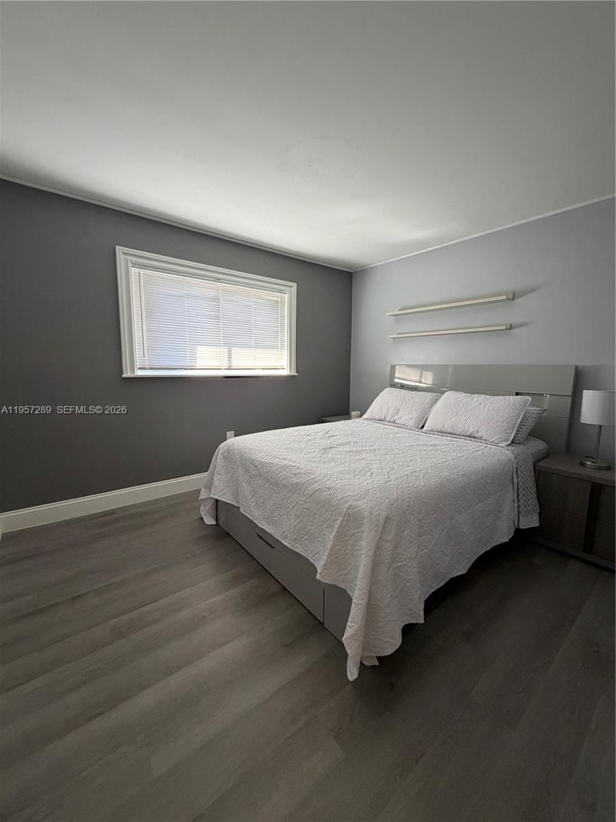 8260 Southwest 149th Court, Unit 9204 Miami, FL 33193 - Photo 13 of 25 a bedroom with bed and window