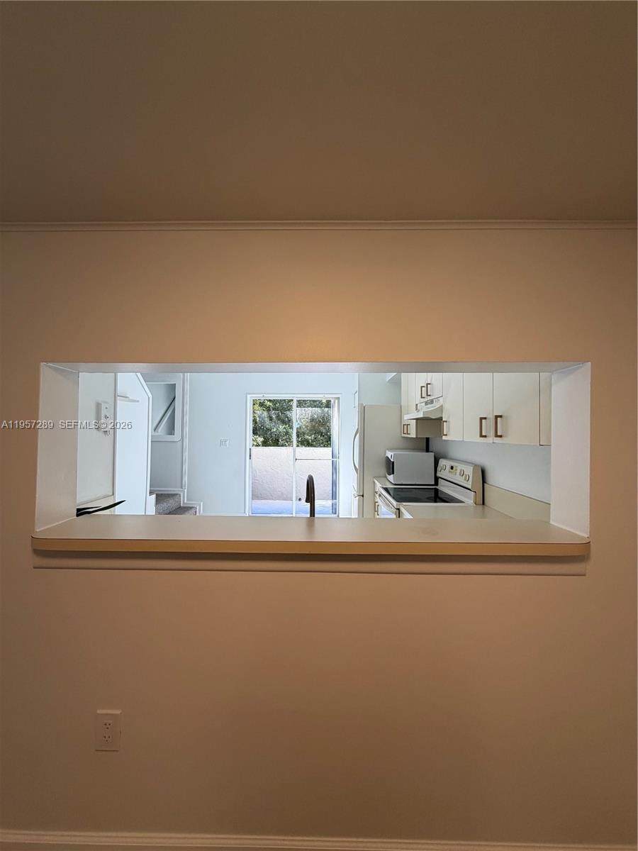8260 Southwest 149th Court, Unit 9204 Miami, FL 33193 - Photo 20 of 25 a view of a living room and a window