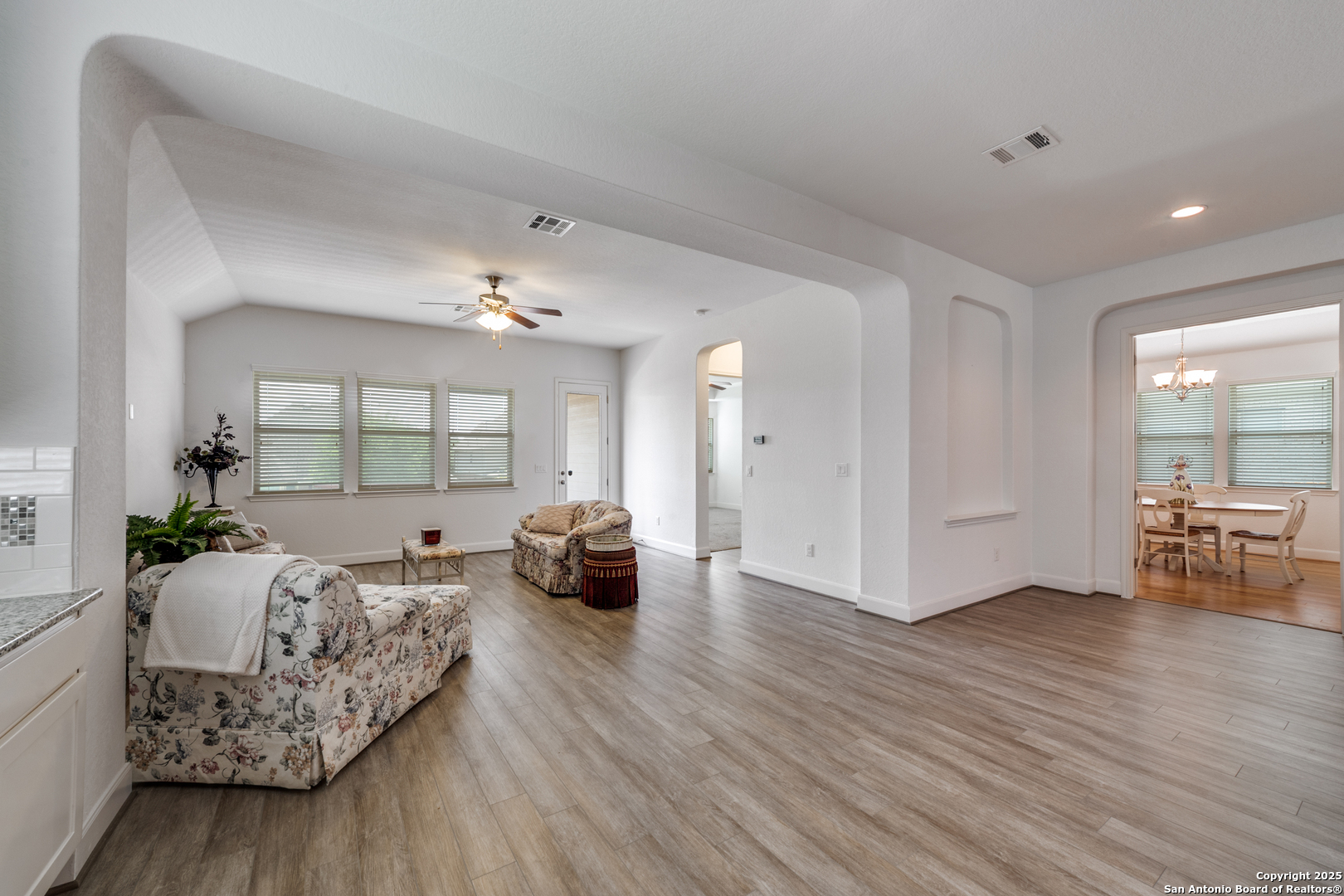 836 Silver Fox Cibolo, TX 78108 - Photo 14 of 26 a living room with furniture and a wooden floor