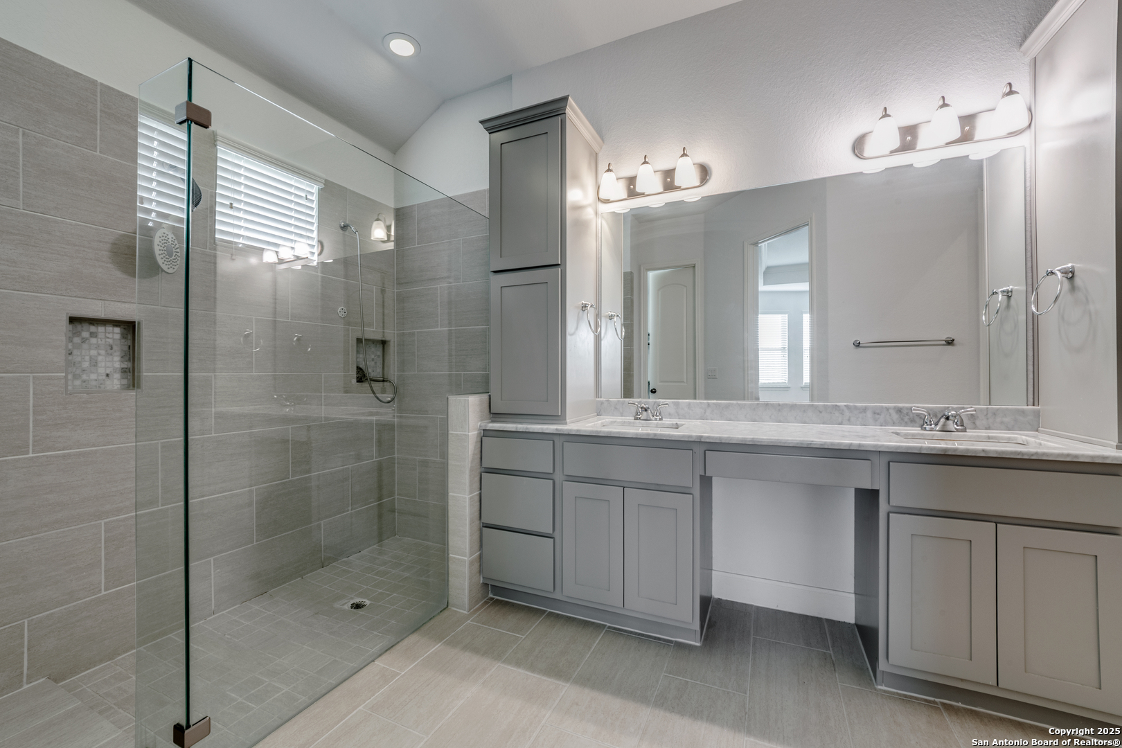 836 Silver Fox Cibolo, TX 78108 - Photo 17 of 26 a bathroom with a granite countertop sink mirror and double