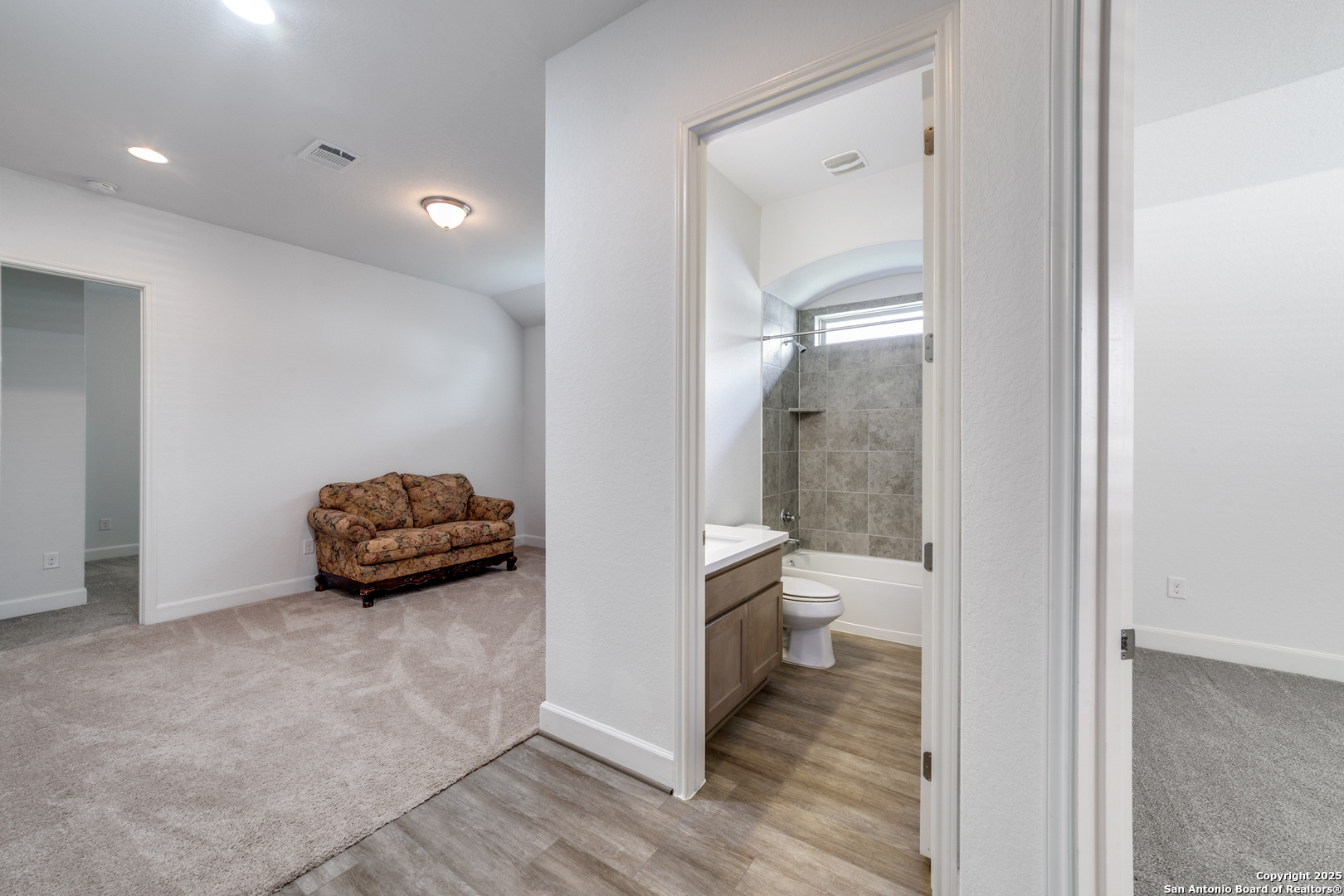 836 Silver Fox Cibolo, TX 78108 - Photo 21 of 26 a view of a room that has a bed and a view of bathroom