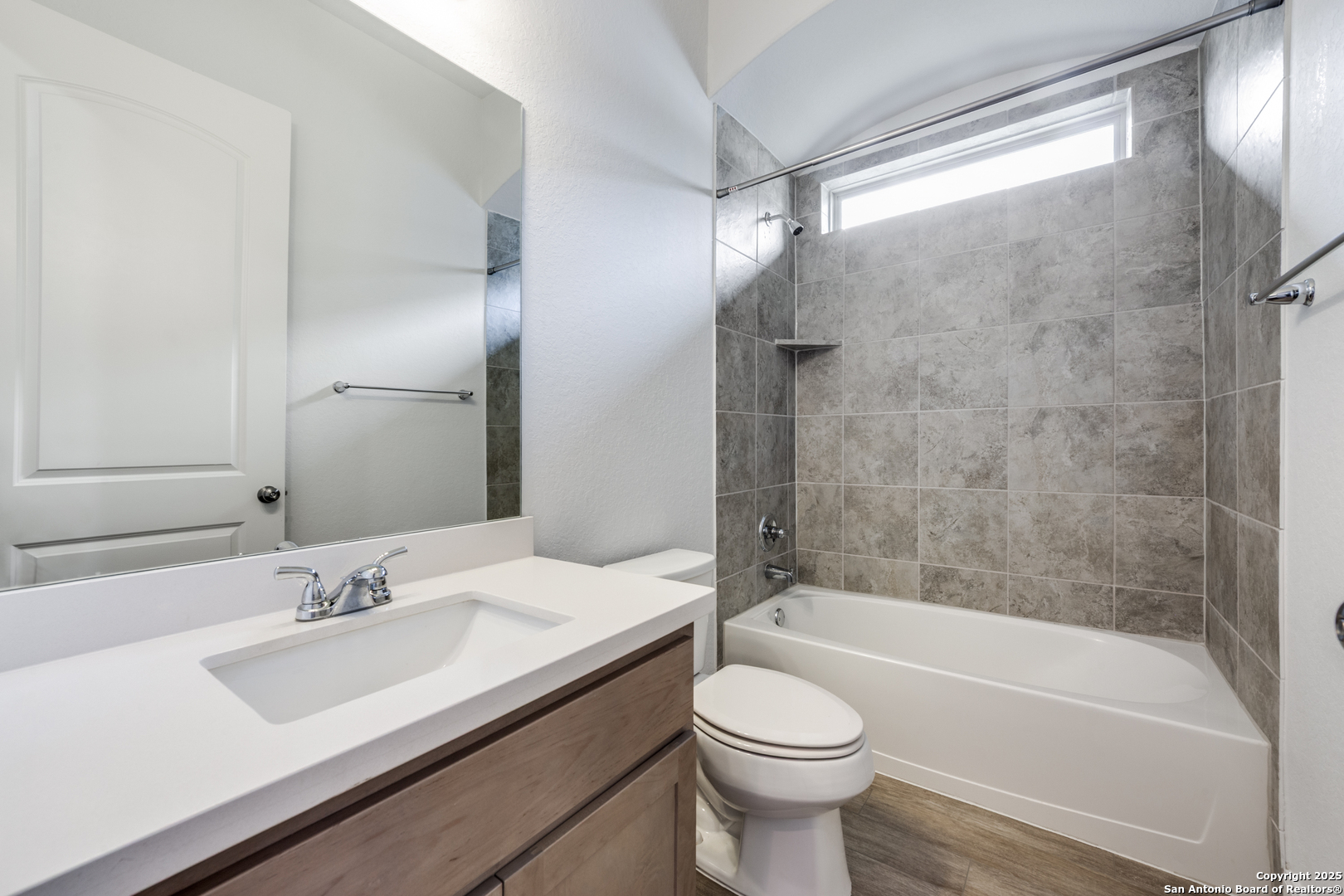 836 Silver Fox Cibolo, TX 78108 - Photo 22 of 26 a bathroom with a sink a toilet and a bathtub