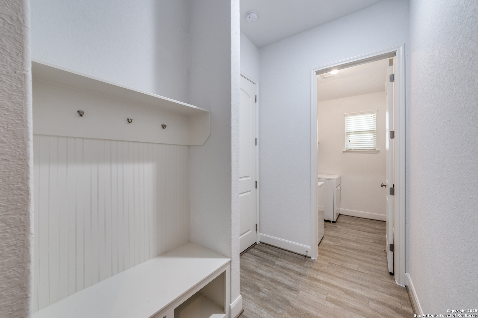 836 Silver Fox Cibolo, TX 78108 - Photo 24 of 26 a view of hallway with wooden floor